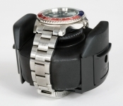 fitting the watch onto the winder holder